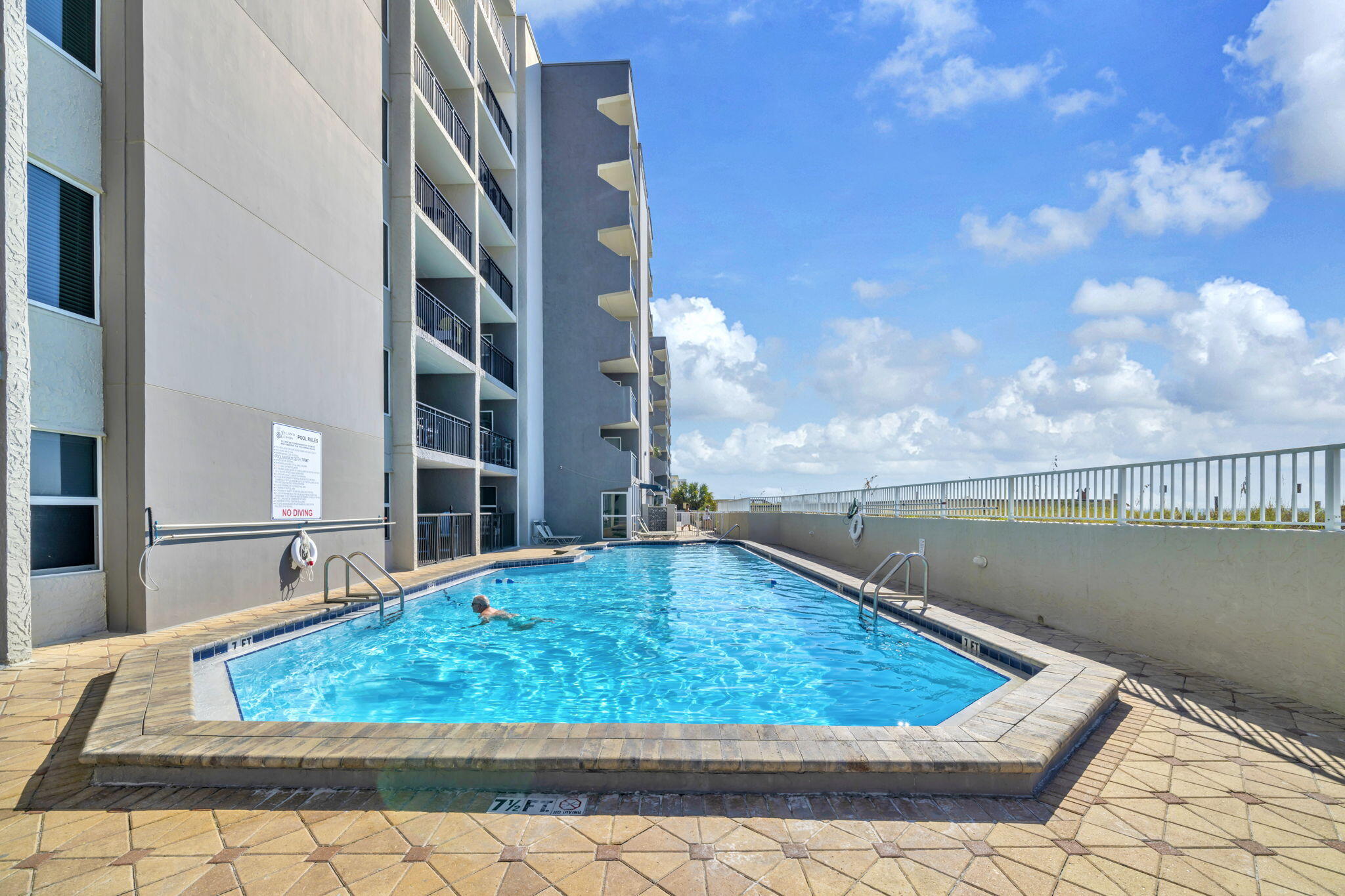 676 Santa Rosa Boulevard, Unit 1F Fort Walton Beach, FL 32548 - Photo 27 of 36 a view of a swimming pool with an outdoor space