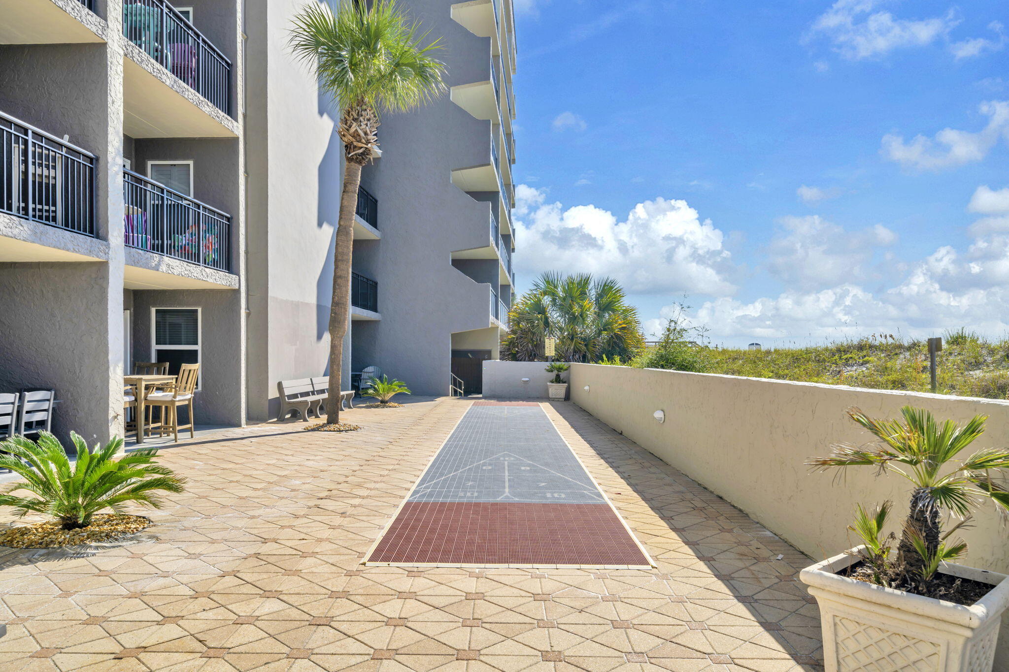 676 Santa Rosa Boulevard, Unit 1F Fort Walton Beach, FL 32548 - Photo 28 of 36 a view of a house with a yard