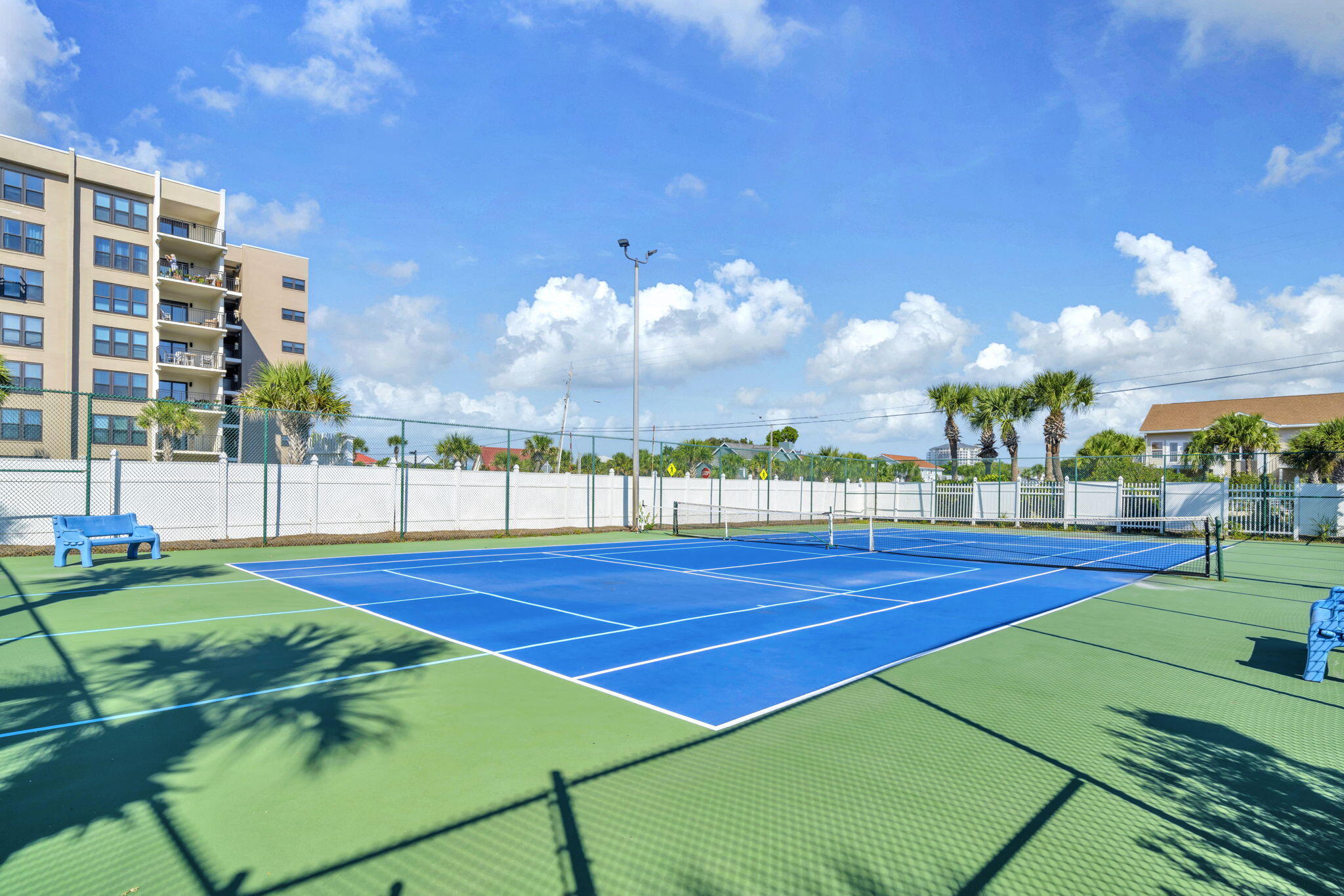 676 Santa Rosa Boulevard, Unit 1F Fort Walton Beach, FL 32548 - Photo 36 of 36 a view of an outdoor space and tennis court