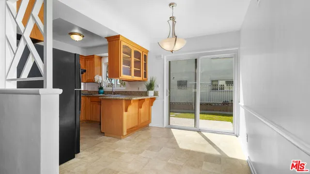 a view of a living room and bathroom