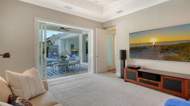 an aerial view of a house with garden space and sitting area