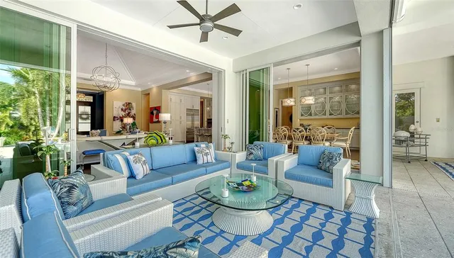 an aerial view of a house with outdoor space and lake view