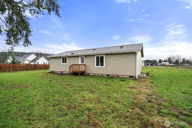 a view of backyard with green space