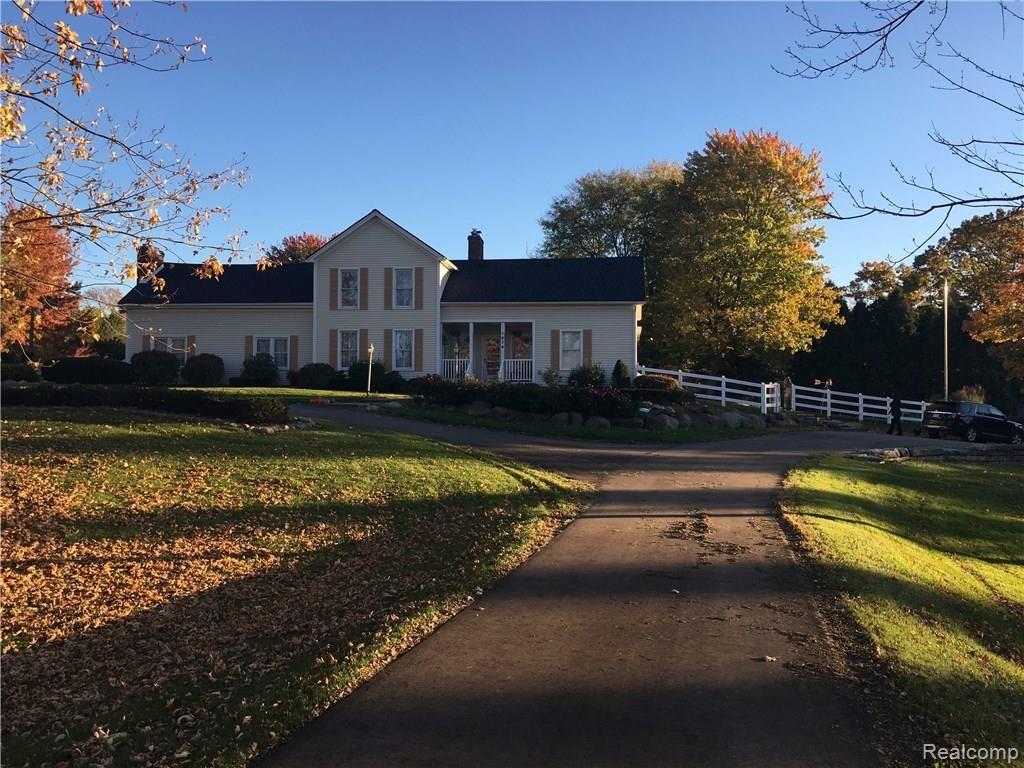 1674 East Romeo Road Oakland, MI 48363 - Photo 53 of 53 Front of house in fall