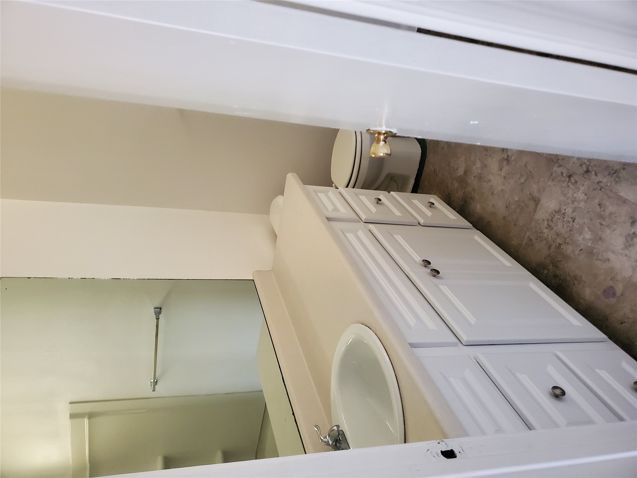 7209 Ritchie Drive Austin, TX 78724 - Photo 12 of 33 a bathroom with a sink and mirror