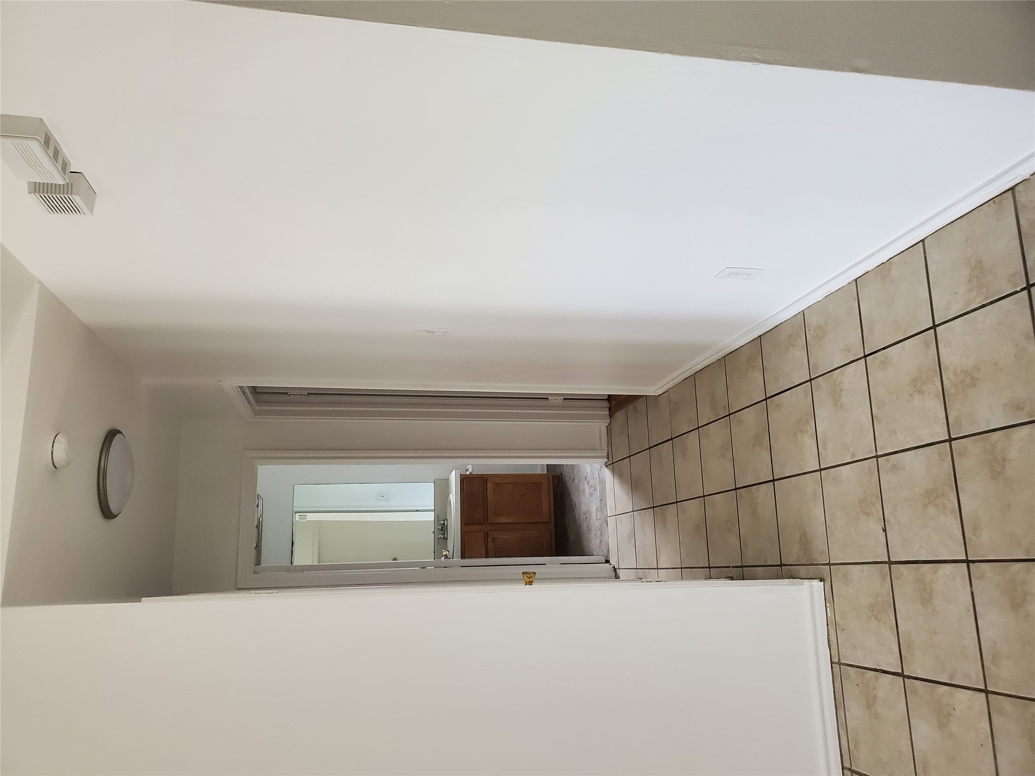 7209 Ritchie Drive Austin, TX 78724 - Photo 17 of 33 a view of an empty room with a window