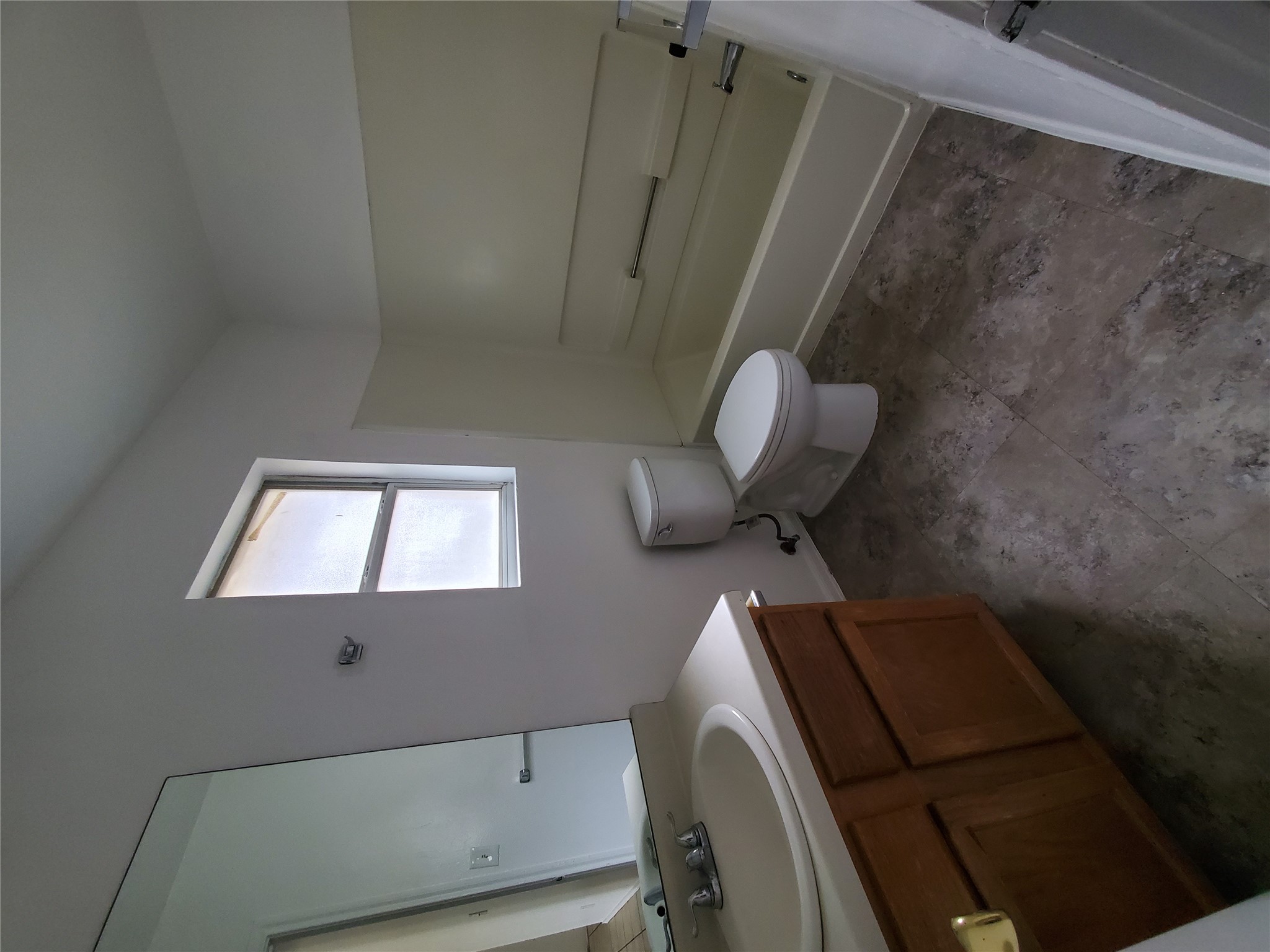 7209 Ritchie Drive Austin, TX 78724 - Photo 24 of 33 a bathroom with a sink toilet and shower
