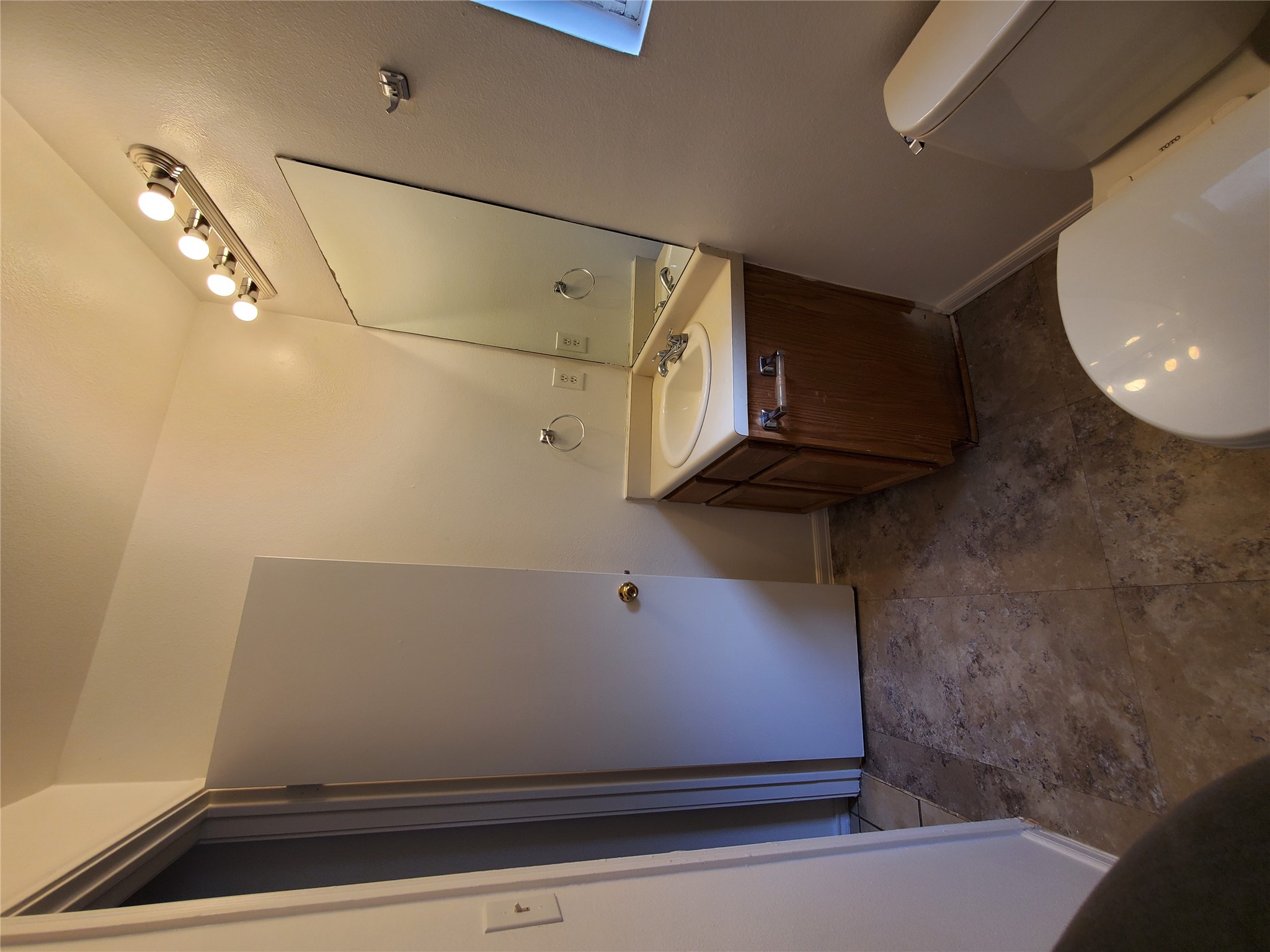 7209 Ritchie Drive Austin, TX 78724 - Photo 25 of 33 a bathroom with a sink toilet and shower