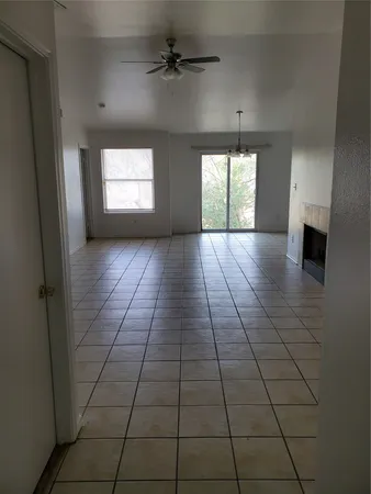 a view of hallway with windows