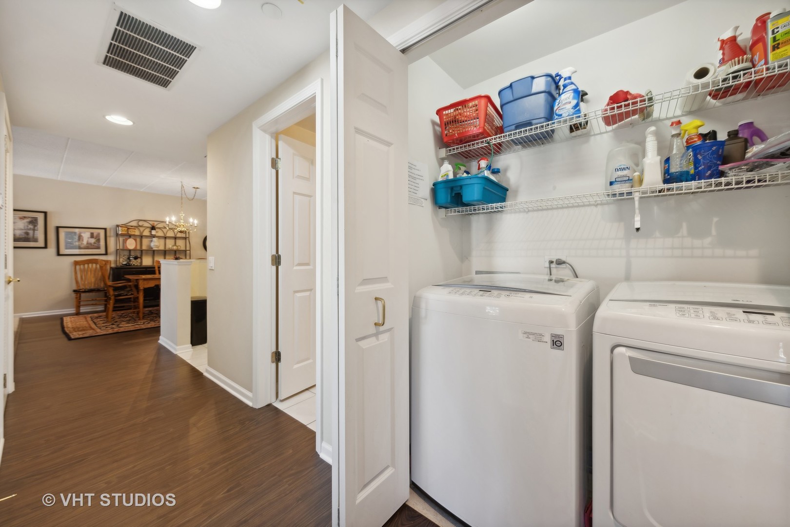 111 North Wheaton Avenue, Unit 306 Wheaton, IL 60187 - Photo 11 of 16 a view of storage and utility room with washer and dryer