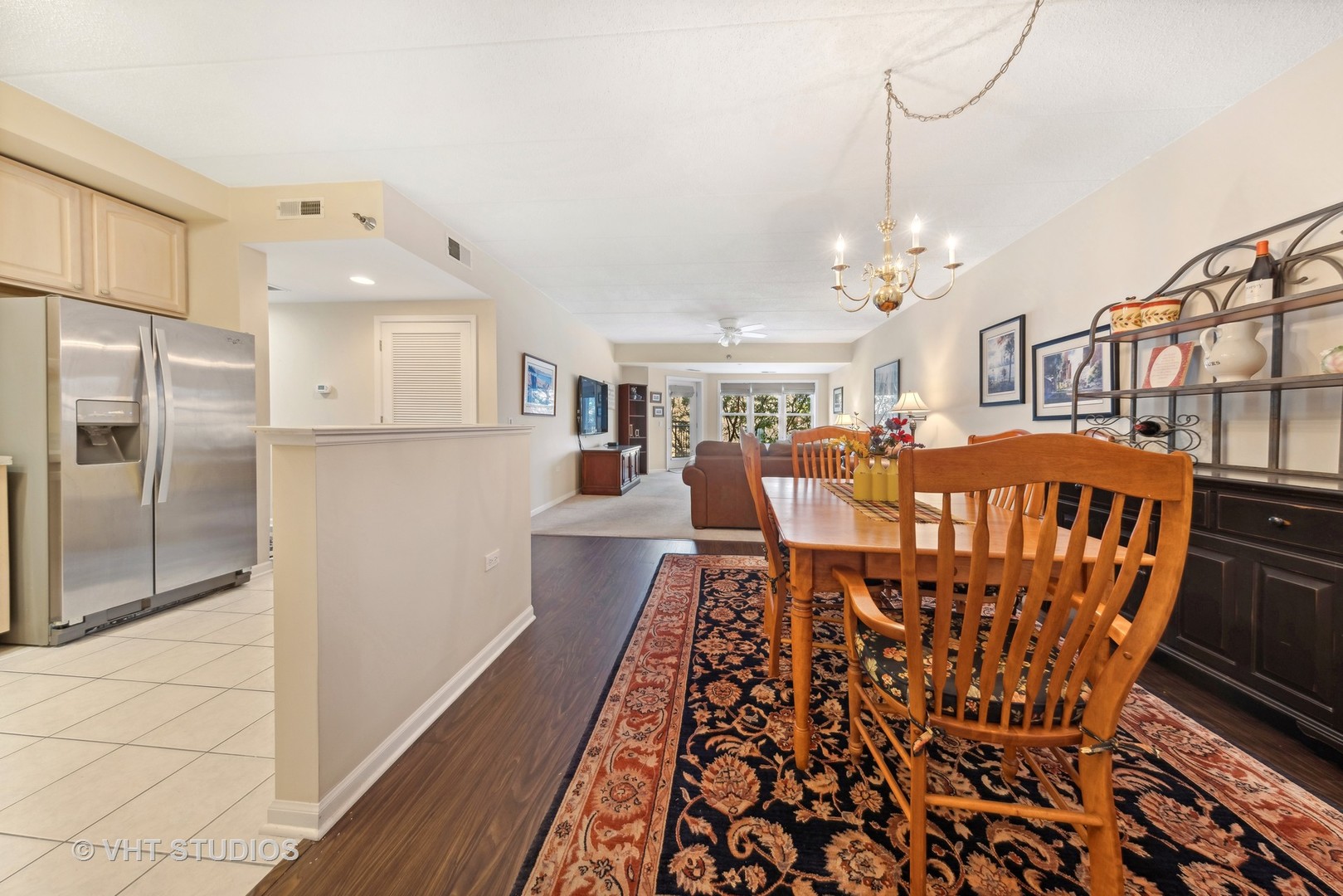 111 North Wheaton Avenue, Unit 306 Wheaton, IL 60187 - Photo 2 of 16 a view of a dining room with furniture