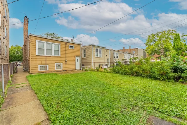 a view of a backyard with a garden