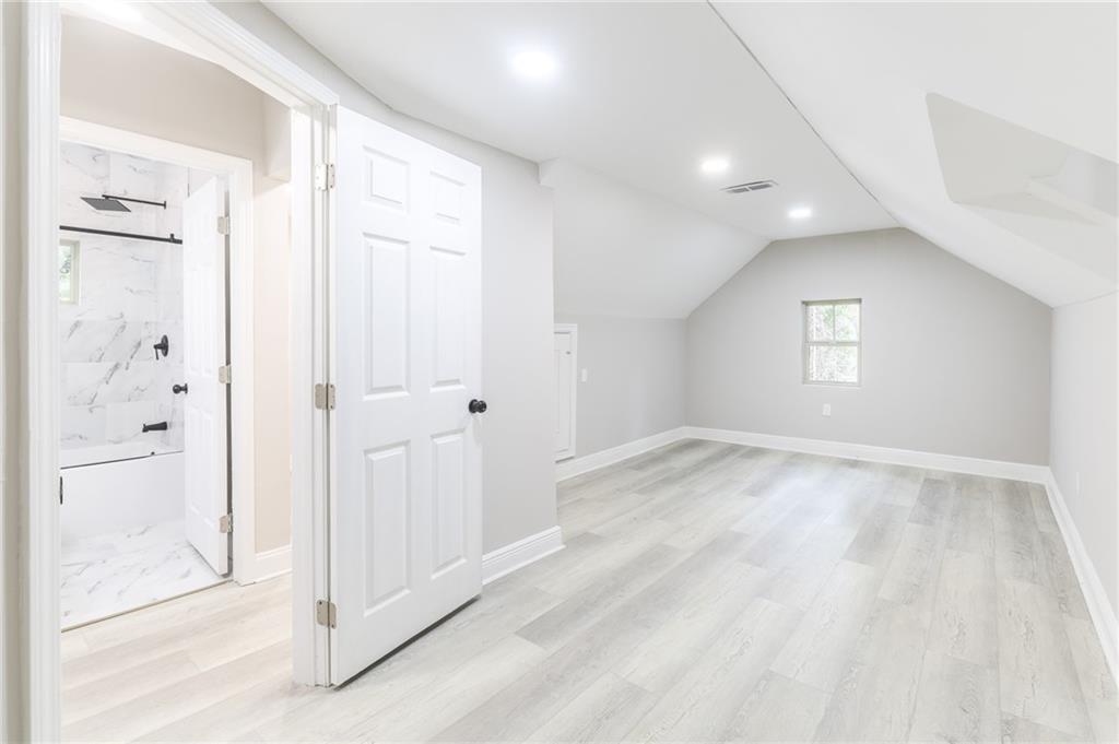 1767 Line Street Decatur, GA 30032 - Photo 19 of 26 an empty room with windows and closet