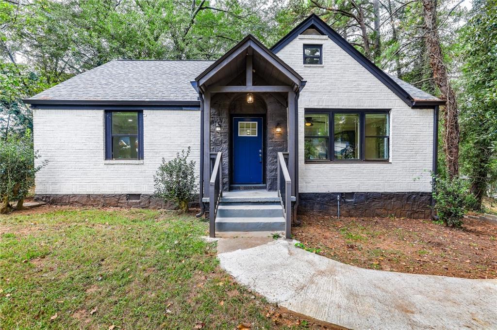 1767 Line Street Decatur, GA 30032 - Photo 2 of 26 a front view of a house with garden