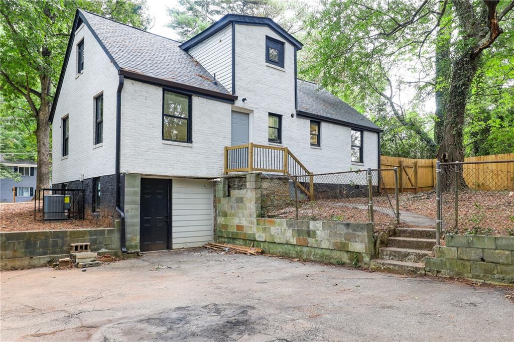 1767 Line Street Decatur, GA 30032 - Photo 23 of 26 a front view of a house with a tree