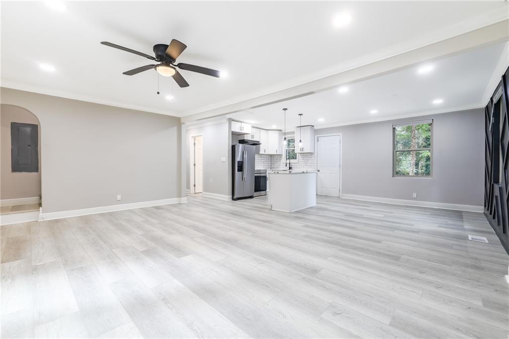 1767 Line Street Decatur, GA 30032 - Photo 4 of 26 a view of empty room with wooden floor and window
