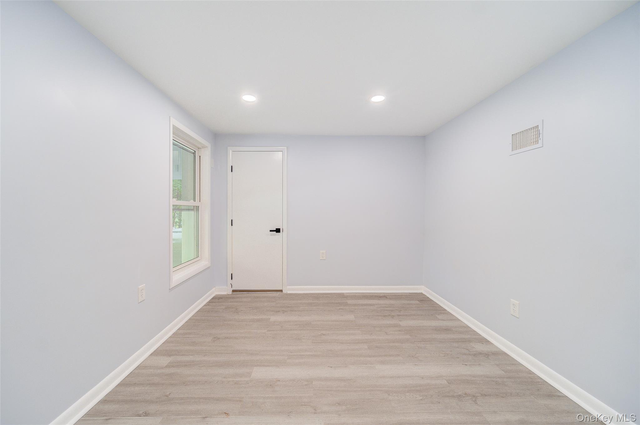 219 Benedict Road Montgomery, NY 12549 - Photo 32 of 50 a view of room with window and wooden floor