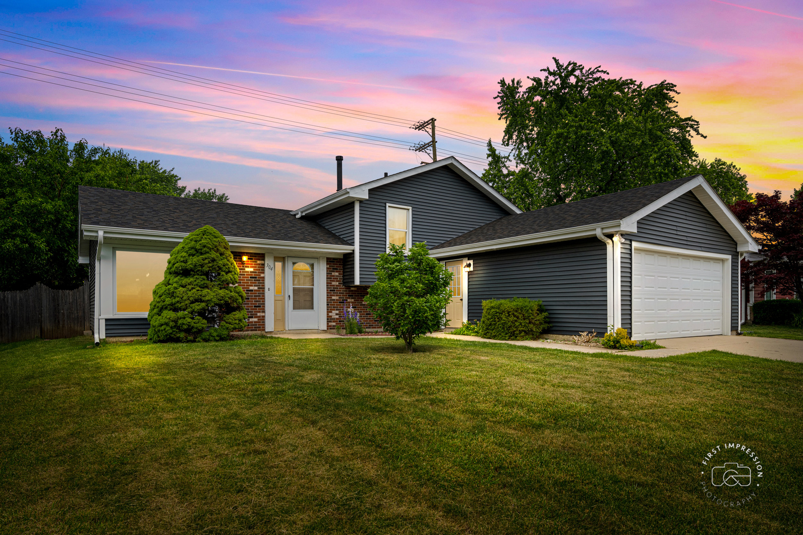 304 Dean Circle Bolingbrook, IL 60440 - Photo 1 of 23 a front view of house with yard and green space