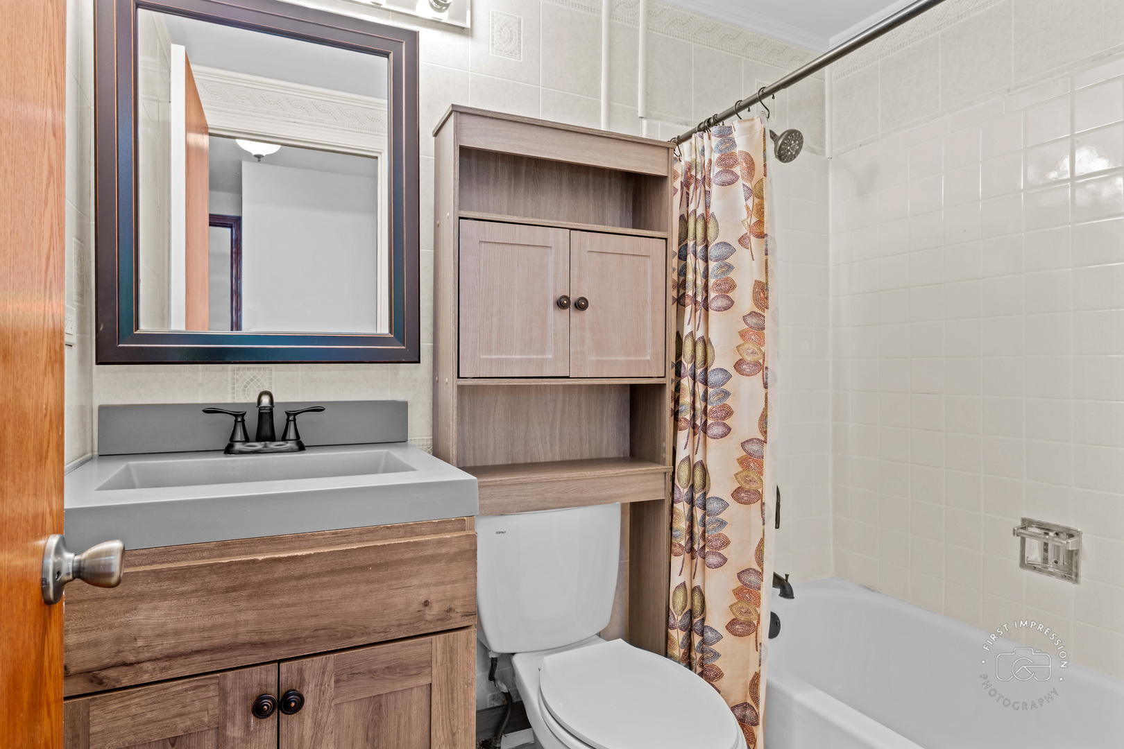 304 Dean Circle Bolingbrook, IL 60440 - Photo 14 of 23 a bathroom with a sink a toilet and shower