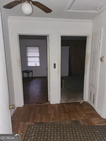 a view of livingroom with furniture and closet