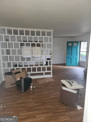 a view of a living room and dining room