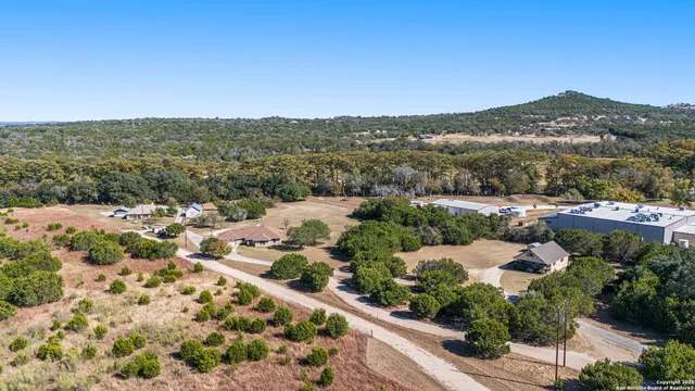 a view of a city with mountains in the background