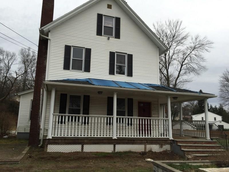 310 Frost Road Waterbury, CT 06705 - Photo 1 of 1 a view of a house with a small deck
