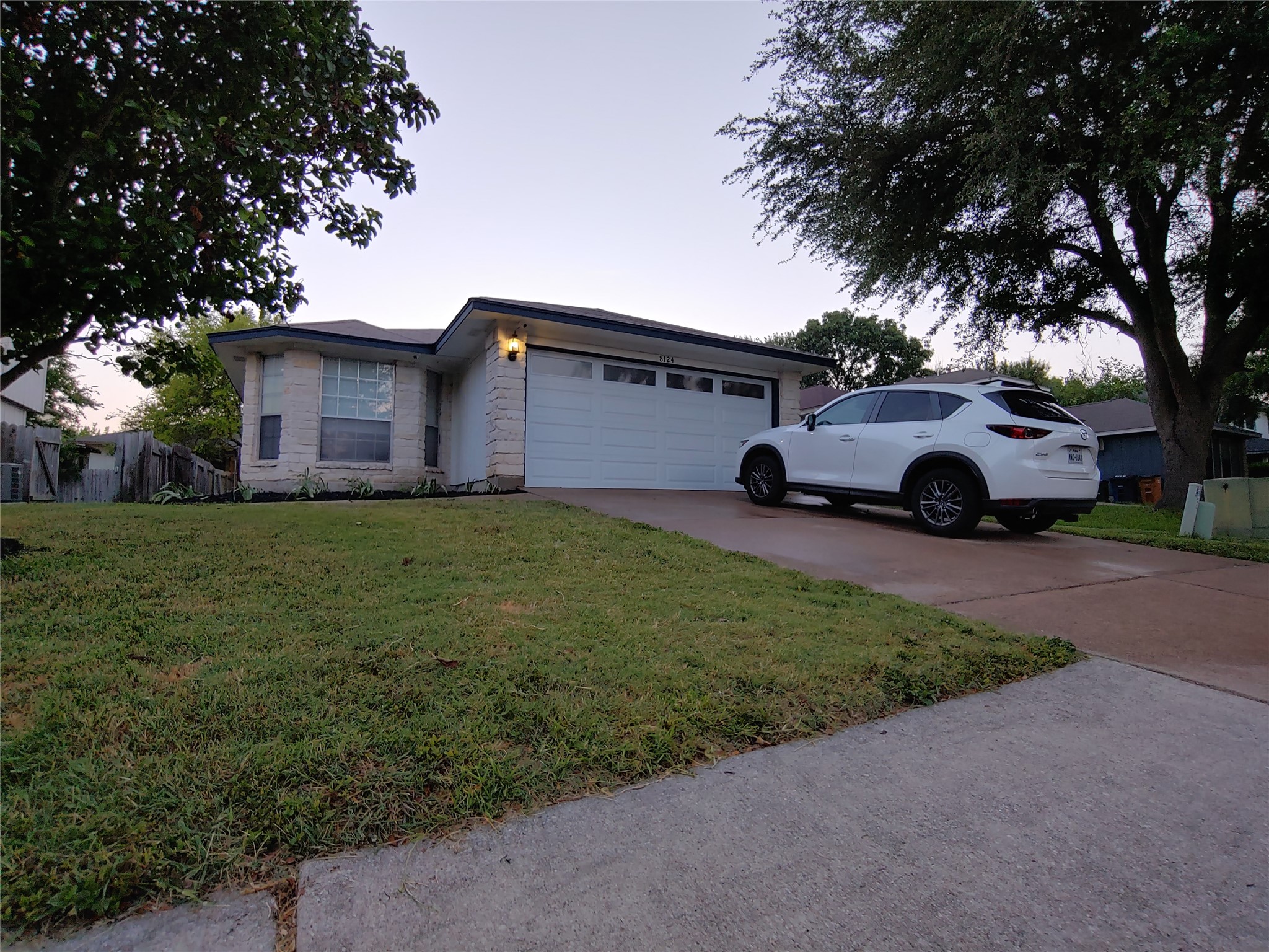 8124 Tockington Way Austin, TX 78748 - Photo 1 of 28 a view of a car in front of a house