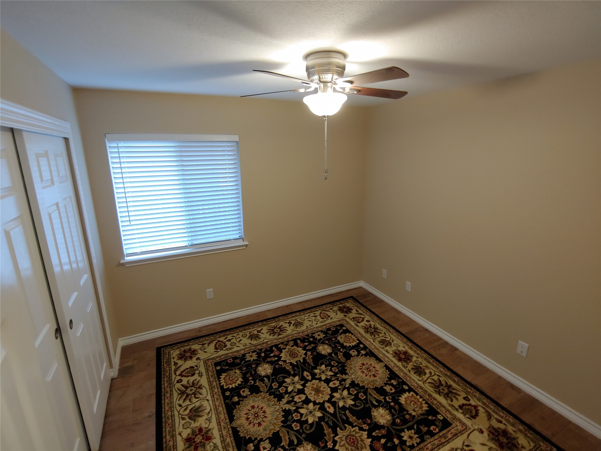8124 Tockington Way Austin, TX 78748 - Photo 20 of 28 a view of a room with window and wooden floor