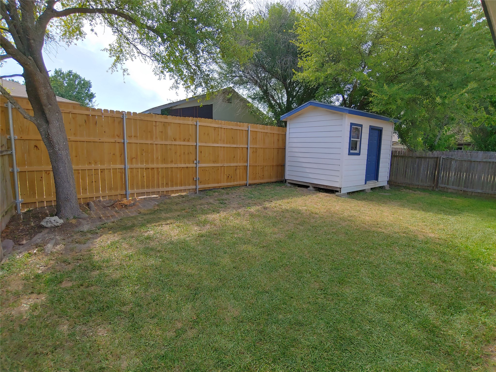 8124 Tockington Way Austin, TX 78748 - Photo 25 of 28 a view of a backyard
