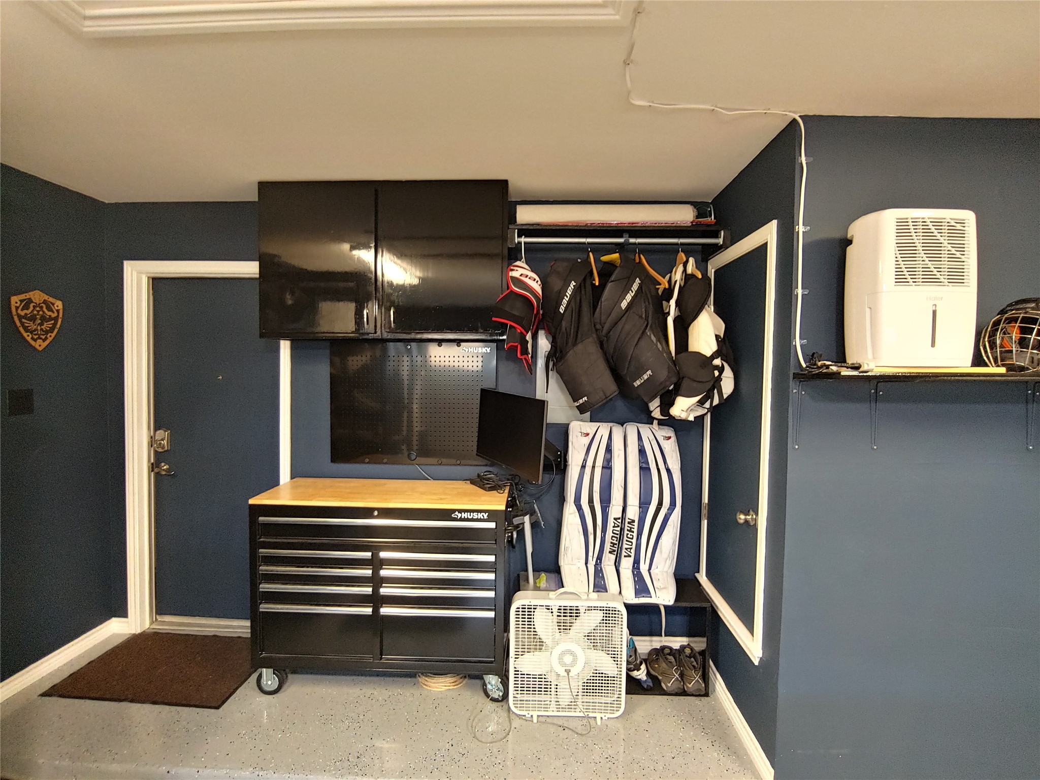 8124 Tockington Way Austin, TX 78748 - Photo 28 of 28 a view of walk in closet with clothes and shoes