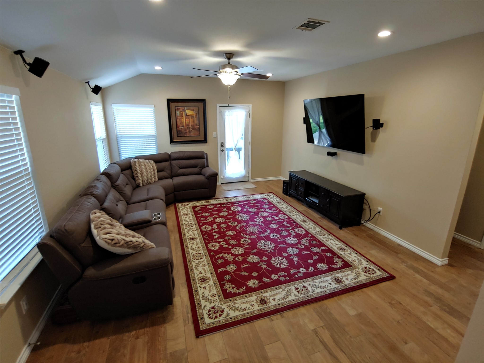 8124 Tockington Way Austin, TX 78748 - Photo 3 of 28 a living room with furniture and a flat screen tv