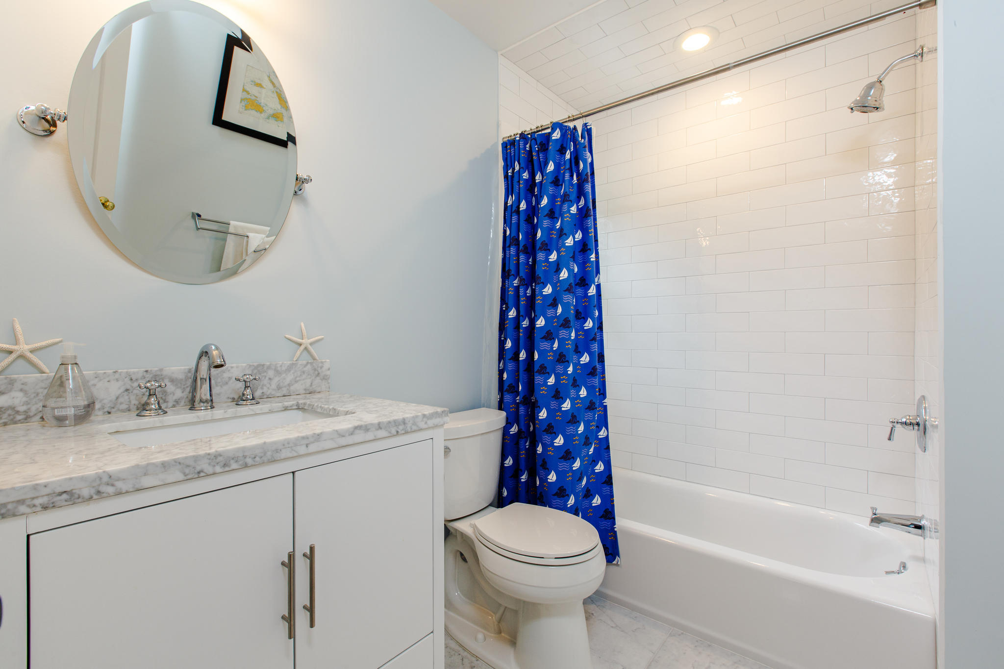 49 Country Club Road Darien, CT 06820 - Photo 16 of 30 a bathroom with a sink toilet and shower