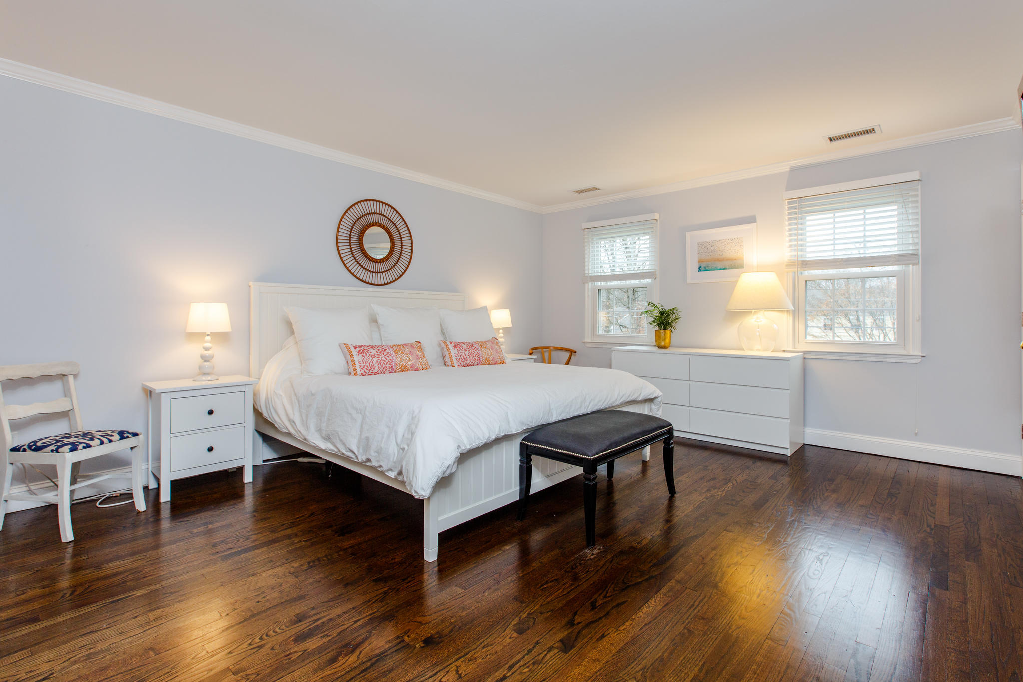 49 Country Club Road Darien, CT 06820 - Photo 19 of 30 a bedroom with a bed and wooden floor