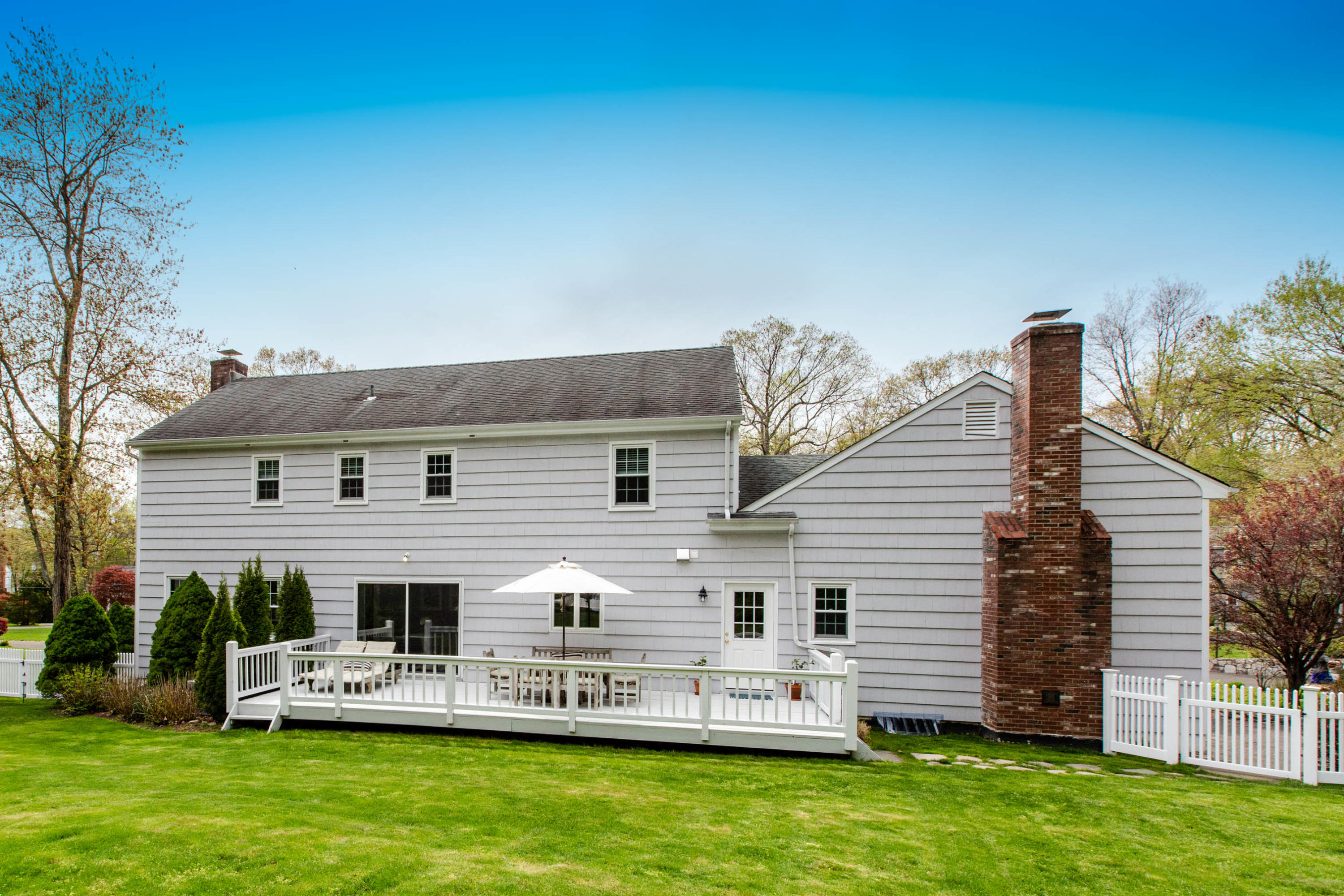 49 Country Club Road Darien, CT 06820 - Photo 26 of 30 a front view of house with yard