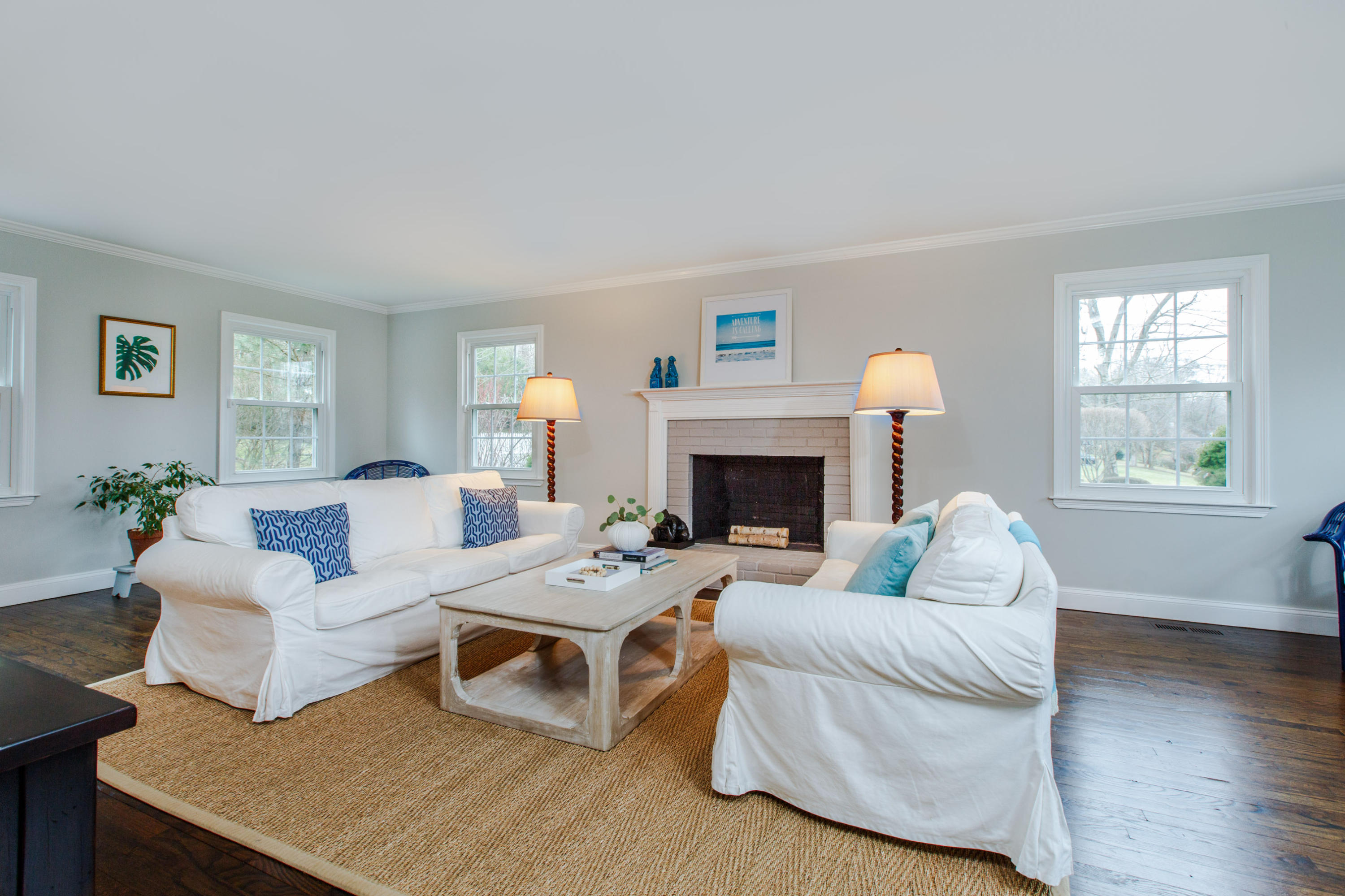 49 Country Club Road Darien, CT 06820 - Photo 4 of 30 a living room with furniture and a fireplace