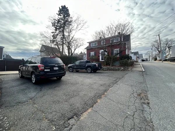 a car parked in front of a house