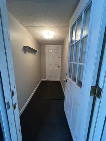 a view of hallway with stairs