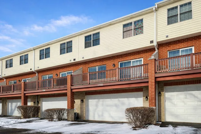 a front view of residential houses