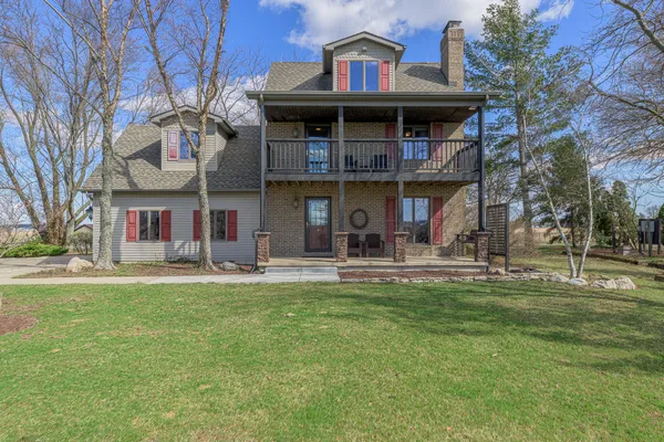 a view of a building with a backyard