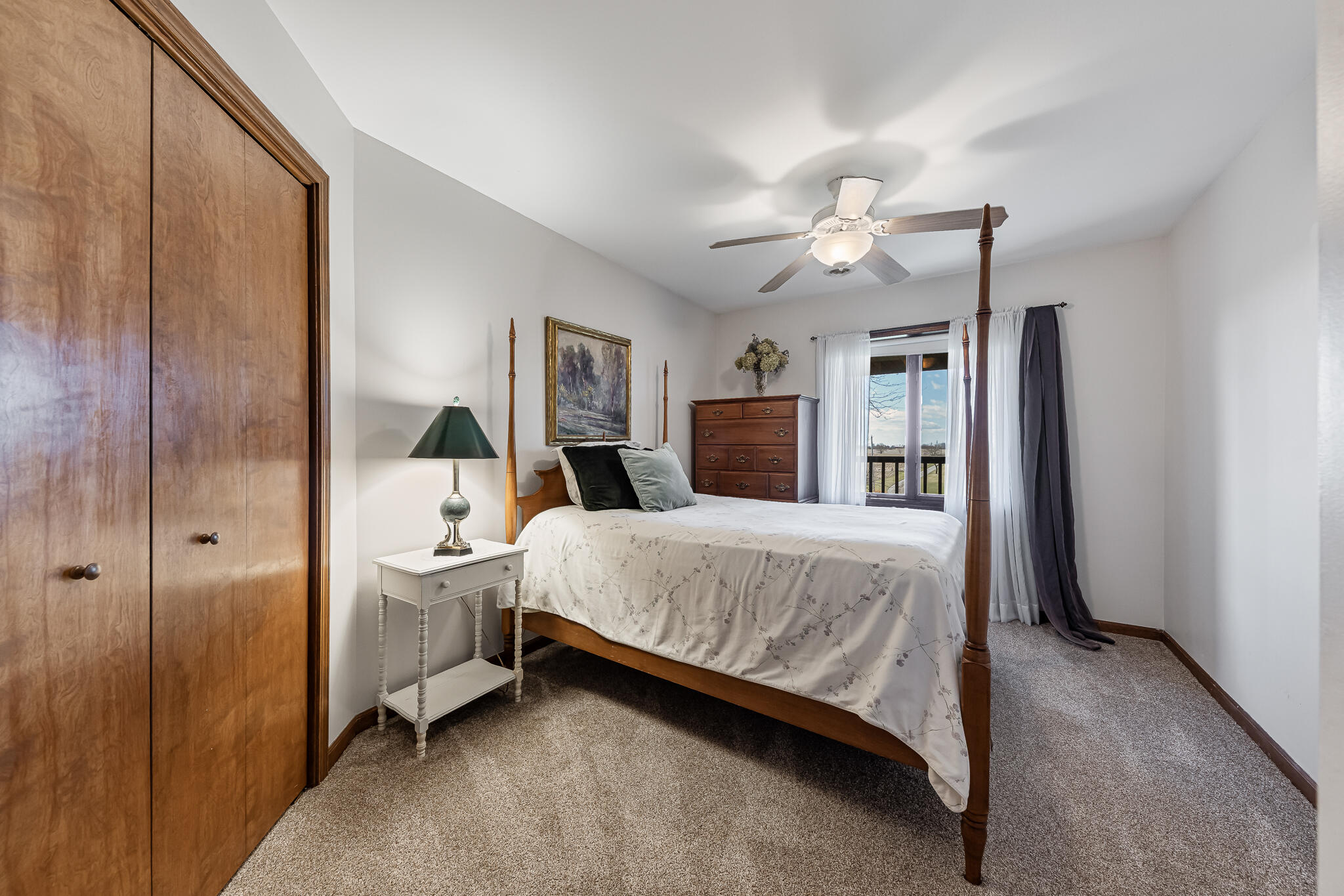 13161 Stateline Road Cedar Lake, IN 46303 - Photo 13 of 30 a bed room with a bed and a chandelier