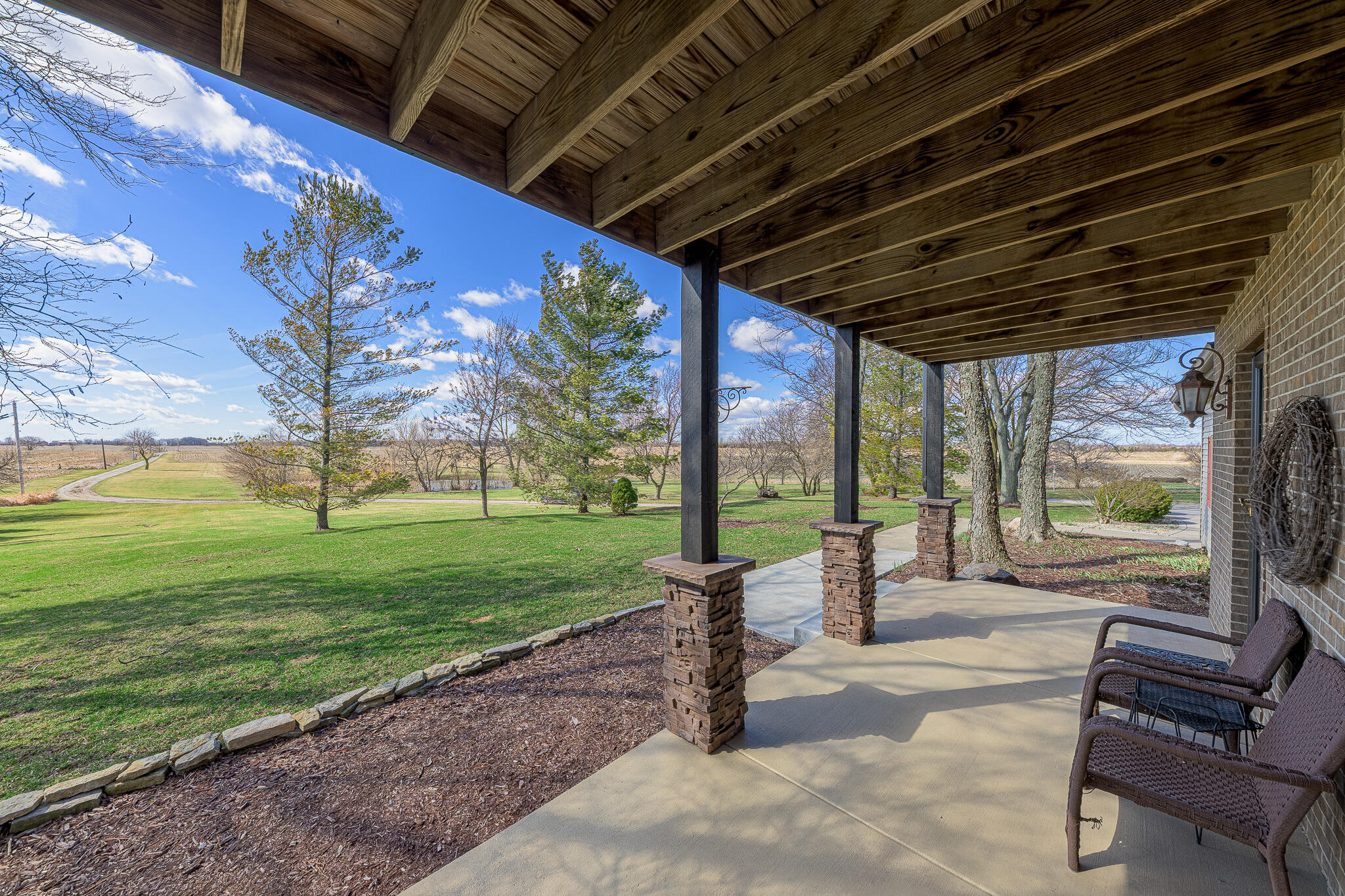 13161 Stateline Road Cedar Lake, IN 46303 - Photo 3 of 30 a patio with yard table and chairs