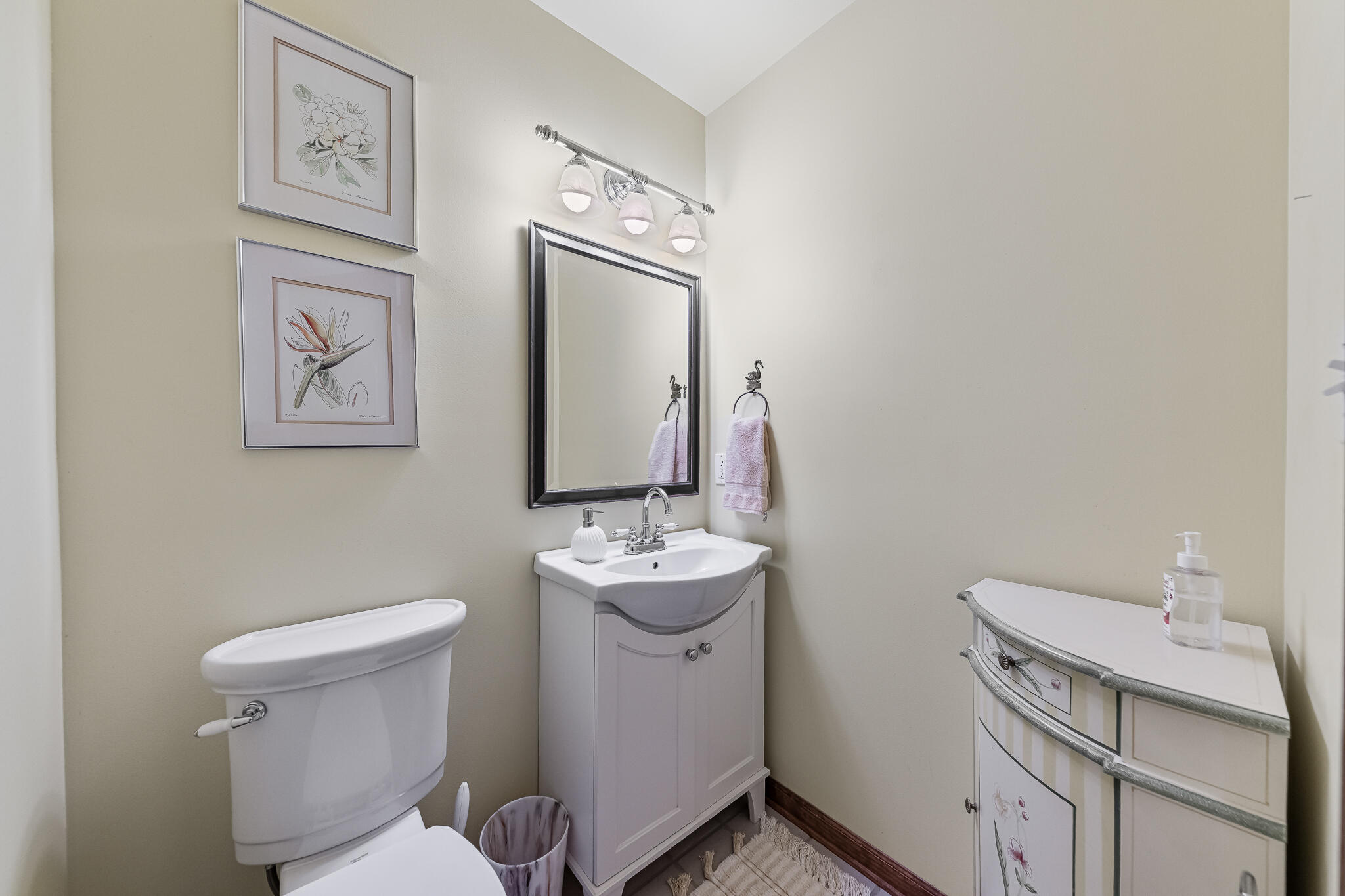 13161 Stateline Road Cedar Lake, IN 46303 - Photo 9 of 30 a bathroom with a toilet sink and mirror