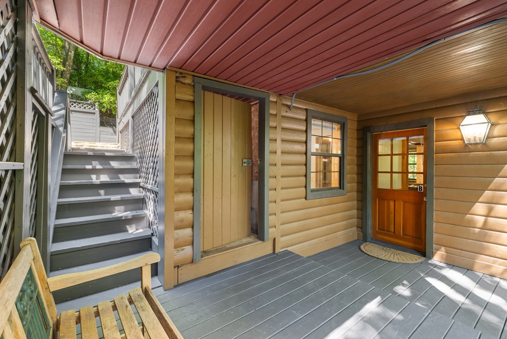556 Cherry Lake Drive Blue Ridge, GA 30513 - Photo 20 of 35 a view of front door with wooden floor and door