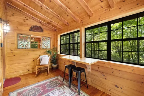 a view of a large room with a large window