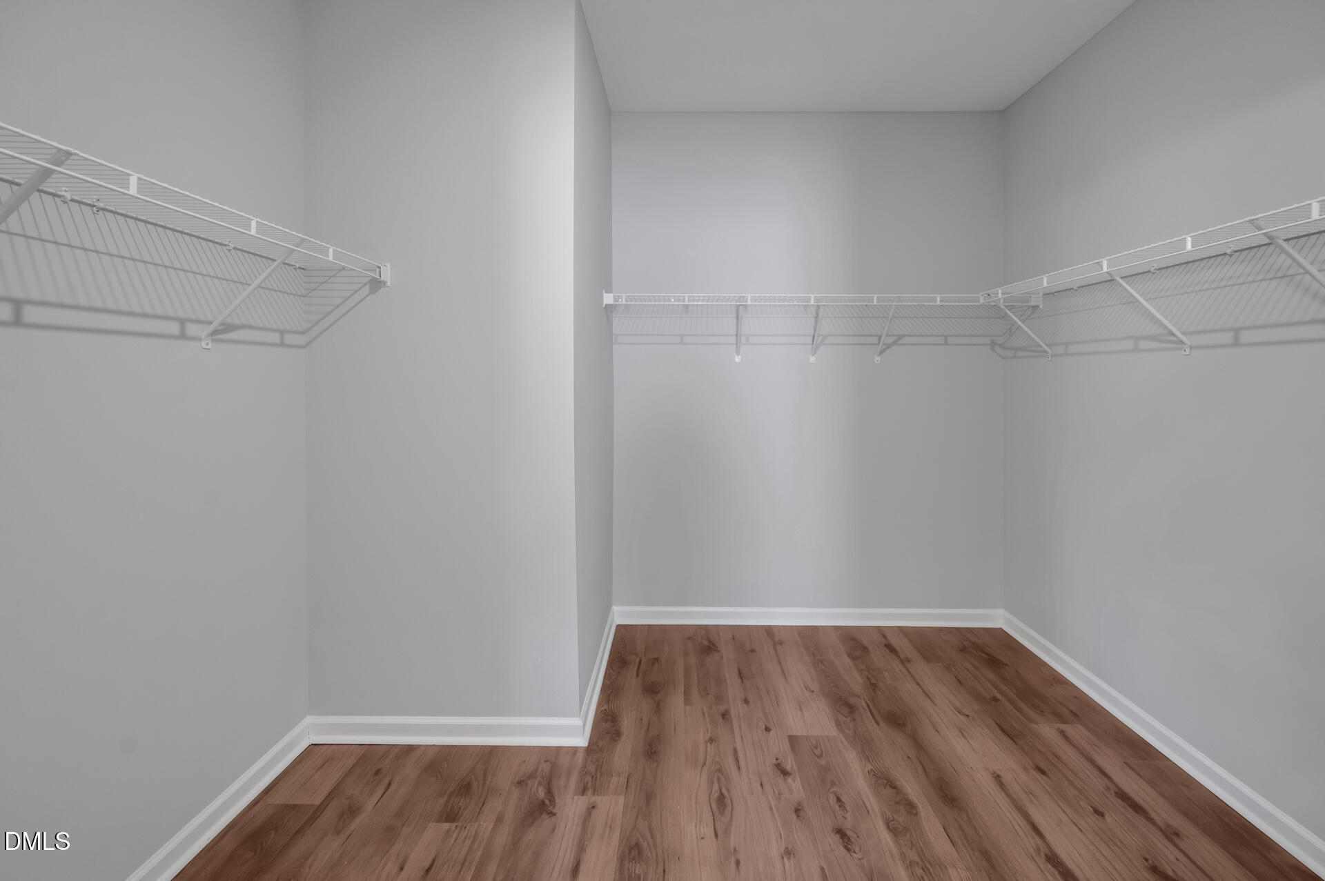 5406 Ripplebrook Drive Durham, NC 27712 - Photo 24 of 37 a view of a room with wooden floor