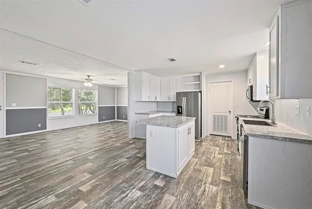 a view of a room with racks on the wall