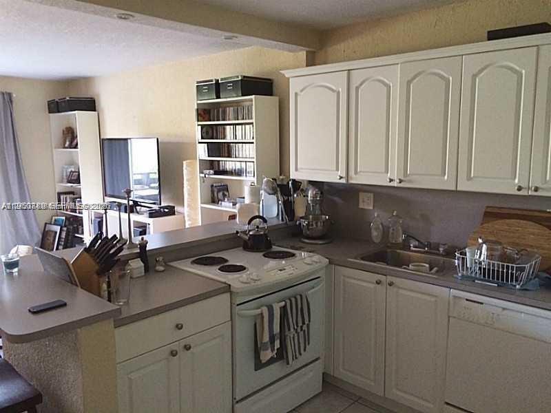 7477 Southwest 82nd Street, Unit C309 Miami, FL 33143 - Photo 4 of 21