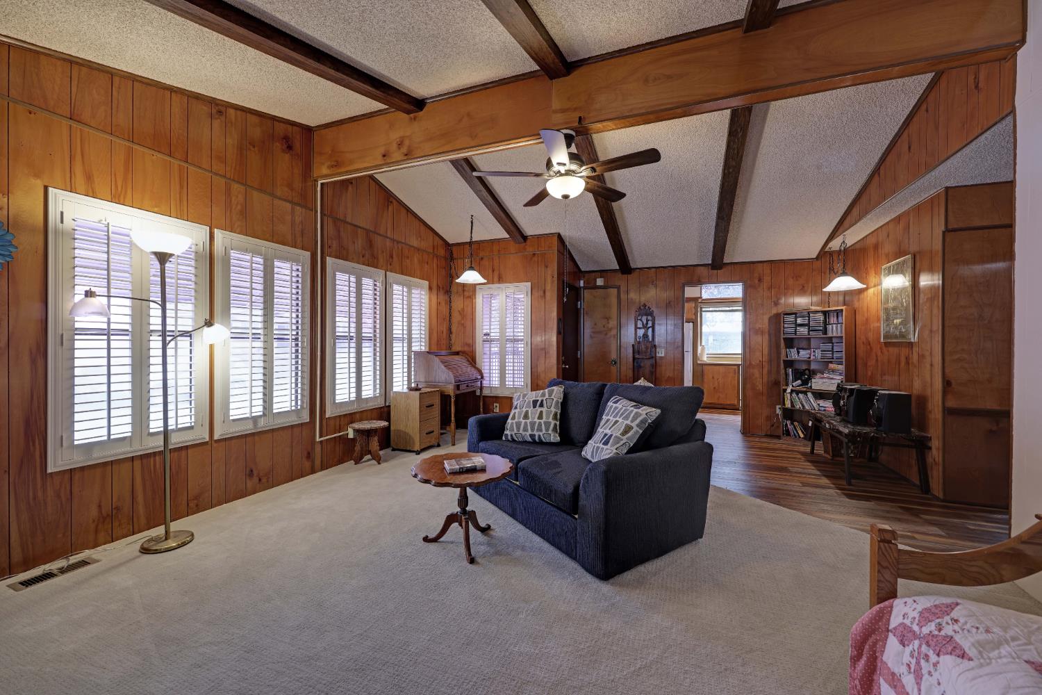 3765 Grass Valley Highway, Unit 263 Auburn, CA 95602 - Photo 12 of 38 a living room with furniture and a large window