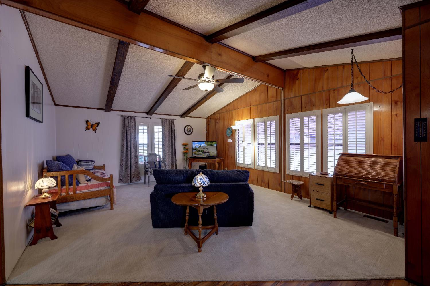 3765 Grass Valley Highway, Unit 263 Auburn, CA 95602 - Photo 13 of 38 a living room with furniture and a large window